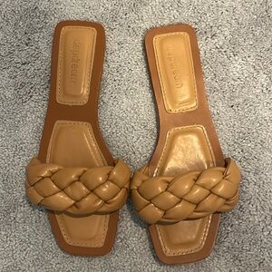 Braided caramel colored flat sandals